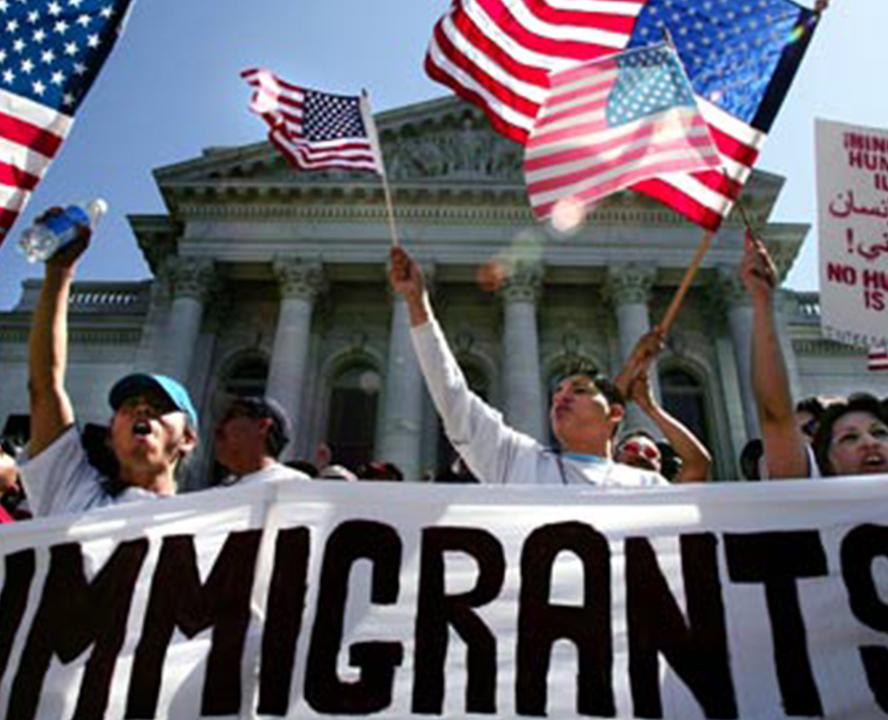 Protester holding American flags