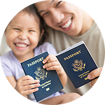 A man and a child proudly hold two passports